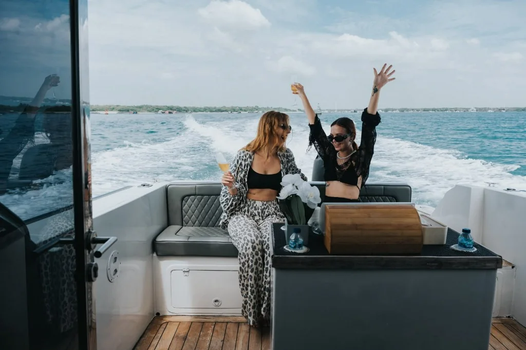 Aft Cockpit Celebration · Sunset Drinks & Wake View