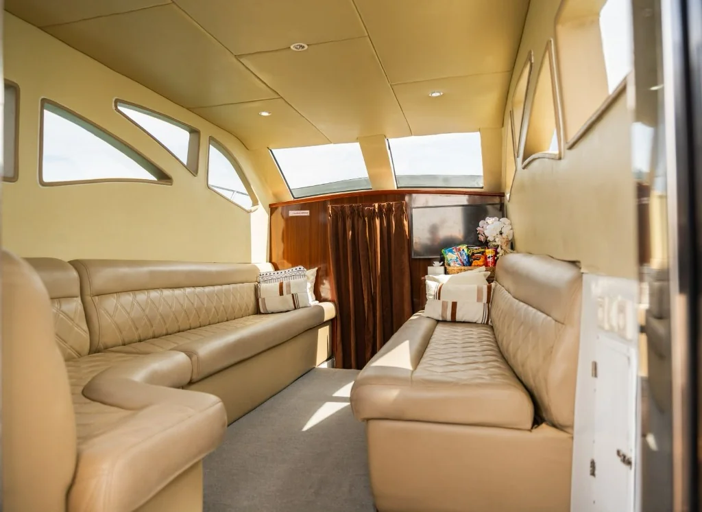 Spacious Main Cabin · Curved Lounge Seating
